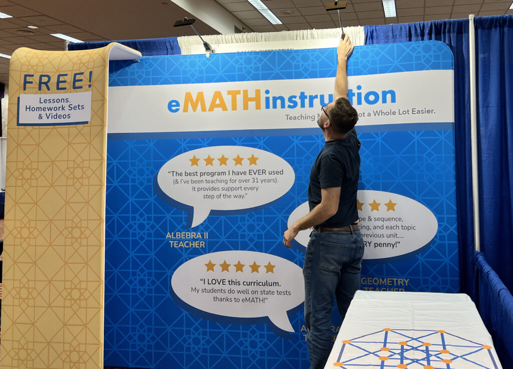Kirk setting up the eMATH conference booth.