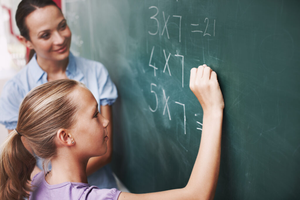 Student practicing whole number multiplication